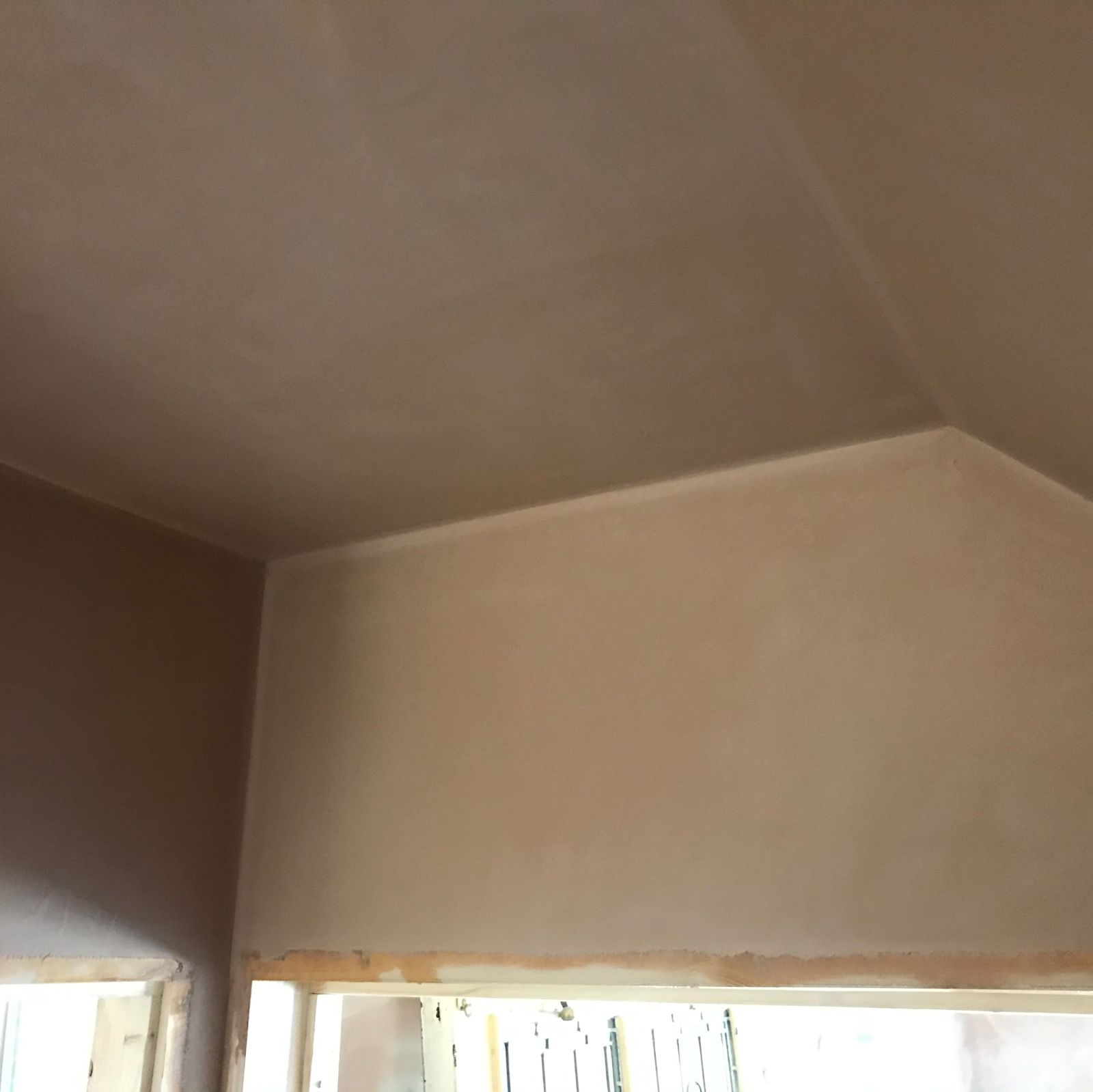 An awkward sloping ceiling, skimmed